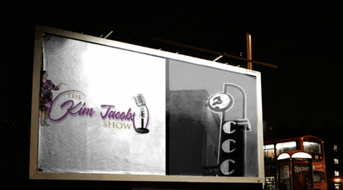 a billboard for the kim jacobs show is lit up