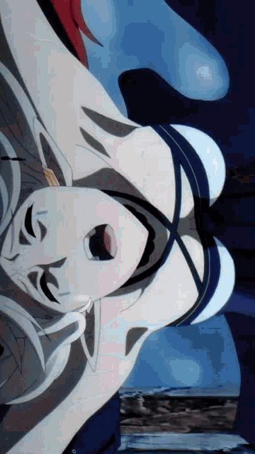 a woman in a swimsuit is laying on her back with her mouth open