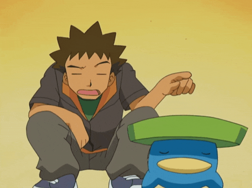 a cartoon character sitting next to a blue frog