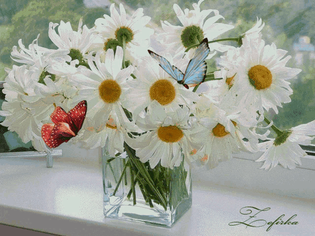 a bouquet of daisies in a glass vase with butterflies
