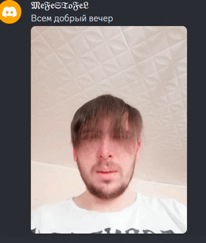 a screenshot of a man with a beard and a discord logo