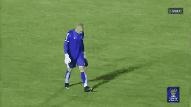 a soccer player is on a field with a live fc logo in the corner