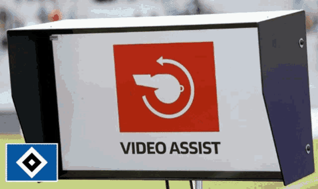 a sign that says video assist with a whistle icon