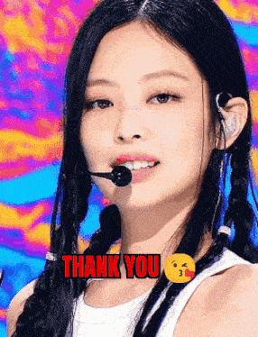 a close up of a woman 's face with the words thank you behind her