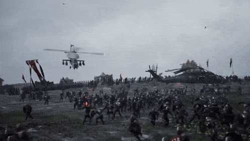 a helicopter is flying over a field of soldiers with the number 12 on the back