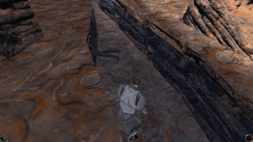 a man in a video game is walking across a rocky cliff
