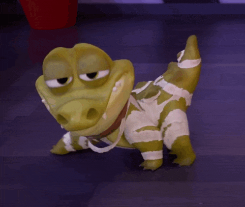 a blurred image of shrek laying on the floor with a purple background