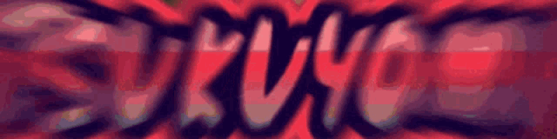 a blurred image of a red background with the word strange written on it