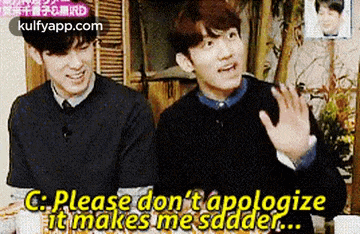 two young men are sitting next to each other and one of them is saying `` please don 't apologize it makes me sadder ... ''