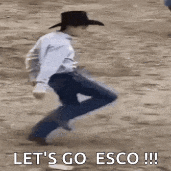 a man in a cowboy hat is jumping in the dirt with the words `` let 's go esco '' .