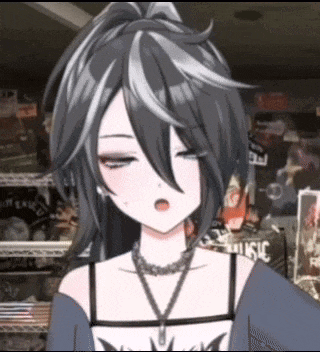 a girl with black and white hair is wearing a necklace and a shirt that says music