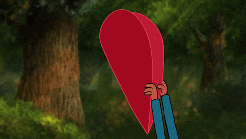 a person is holding a red heart with the word no written on it