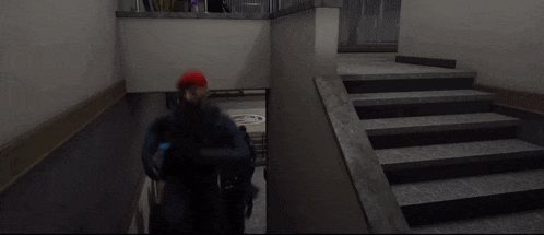 a group of police officers walking down stairs