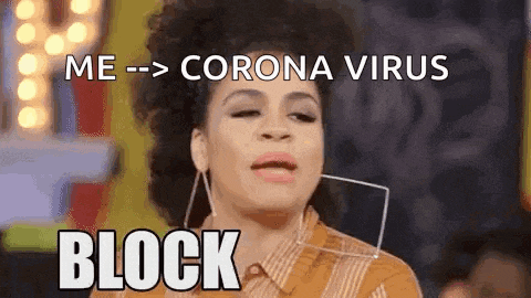 a woman is making a funny face while talking about the coronavirus .
