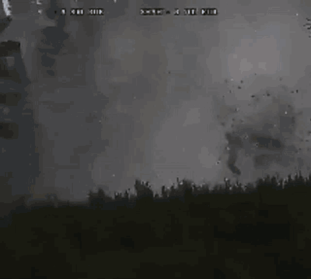 a man is flying through the air while holding a gun in a video game scene