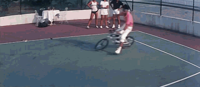Bicycle Bicycle Stunt GIF - Bicycle Bicycle Stunt Tennis GIFs