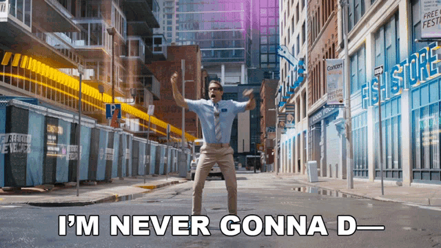 a man dancing on a city street with the words " i 'm never gonna d " above him