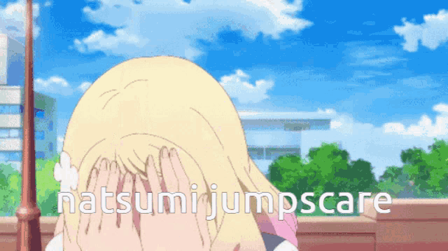 a cartoon of a girl covering her face with her hands with the words natsumi jumpscare below her