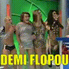 a group of women are standing in front of a green screen with the words demi flopou in yellow letters