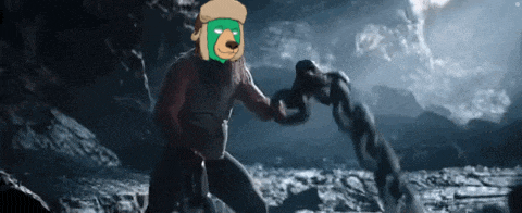 a cartoon character with a green mask on his face is standing next to a chain .
