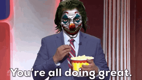 a man in a suit and tie with a clown face on his face eating popcorn and saying you 're all doing great