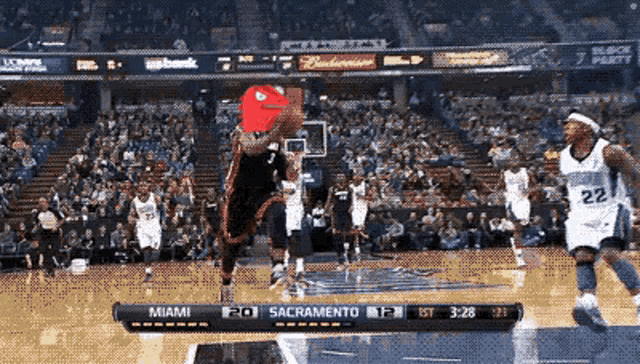 a basketball game between miami and sacramento is being played