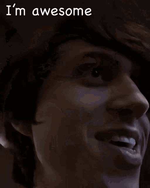 a close up of a person 's face with the words " i 'm awesome " written above it