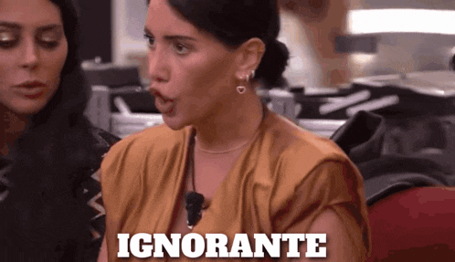 a woman with the word ignorante written on her shirt