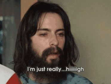 a man with long hair and a beard says " i 'm just really ... hiiiiiigh "
