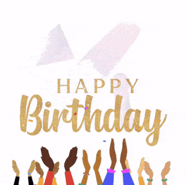 a group of people raising their hands in the air in front of a sign that says happy birthday