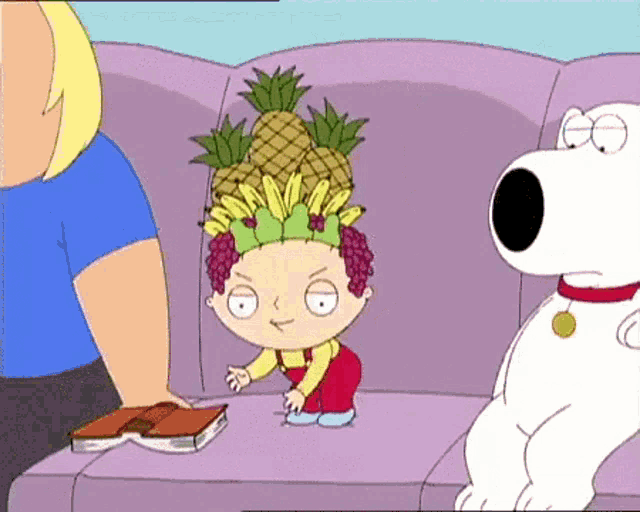 a cartoon character sitting on a couch with a book and a pineapple on his head