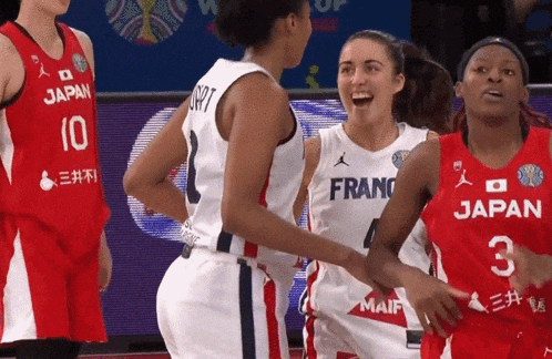 a female basketball player wearing a jersey that says japan on it
