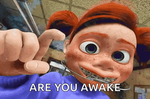 a cartoon character with braces on her teeth is pointing at the camera and saying are you awake