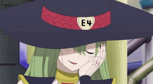 a girl with green hair is wearing a black hat with the number e4 on it