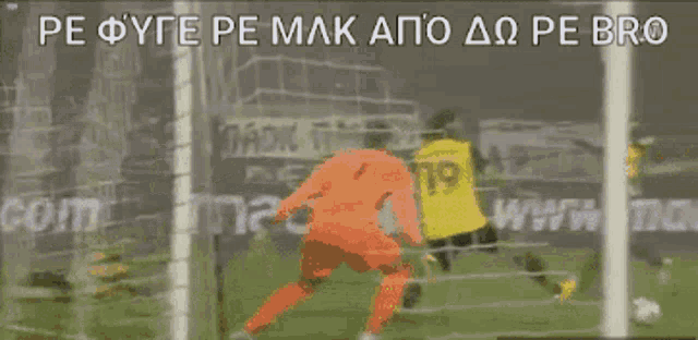 a group of soccer players are playing on a field and one of them is wearing a number 9 jersey