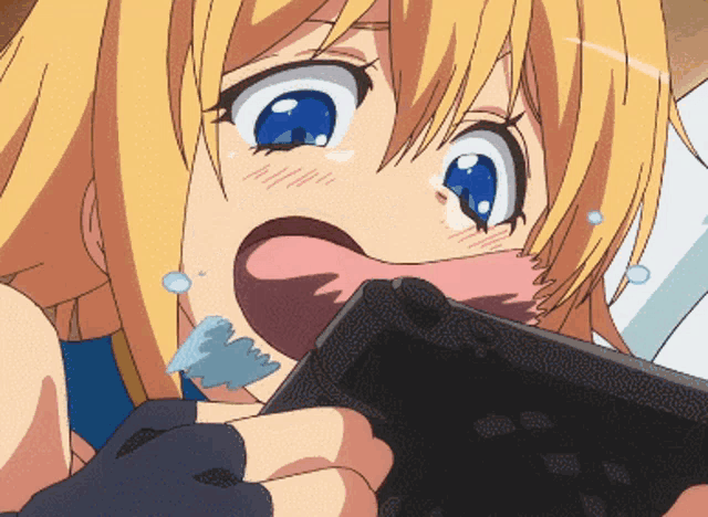 a girl with blonde hair and blue eyes is crying