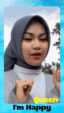 a picture of a woman wearing a hijab with the words queen i 'm happy below her