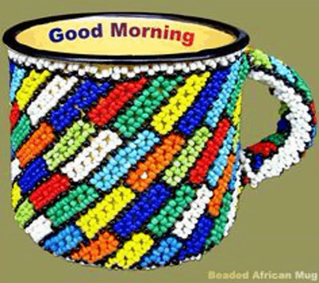 a colorful beaded mug with the words good morning on it