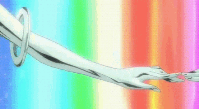 a rainbow colored background with a white object floating in the air