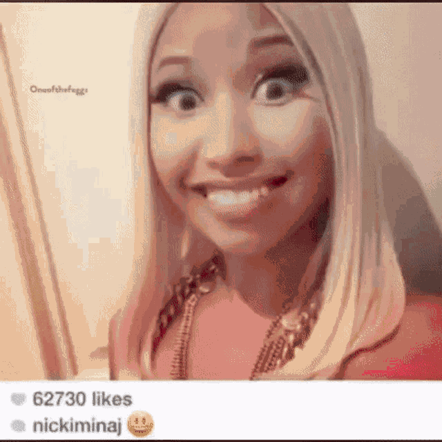 a woman with blonde hair and a gold necklace is smiling and has 62730 likes on her post