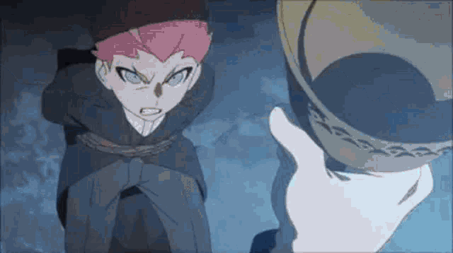 a boy with pink hair is tied up and standing next to a person holding a bowl in a dark room .