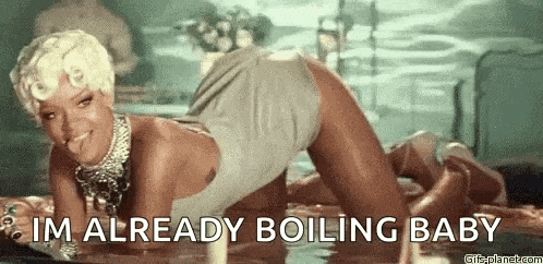 a woman is kneeling in the water with the words `` i 'm already boiling baby '' written below her .