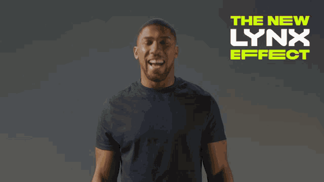 a man in a black shirt is standing in front of a sign that says the new lynx effect