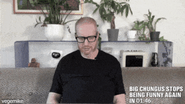 a video of a man sitting on a couch says big chungus stops being funny again in 01:46