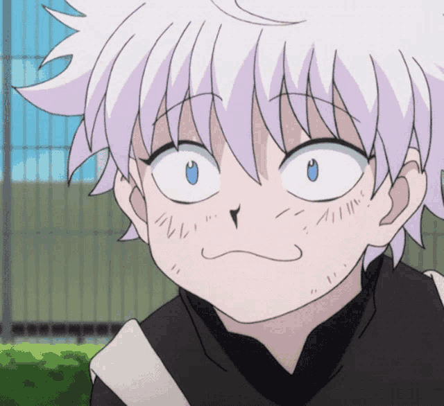 a close up of a person with white hair and blue eyes