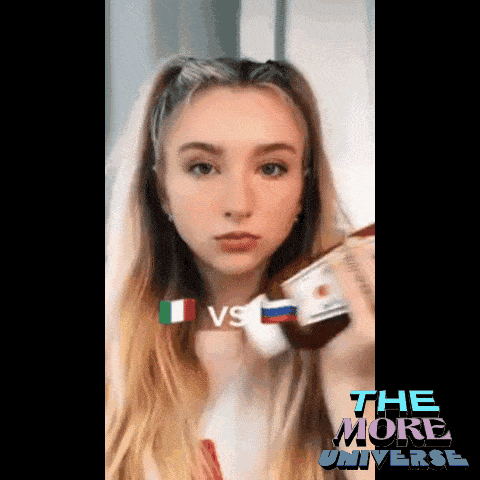 a girl is holding a bottle with the words " the more universe " on it