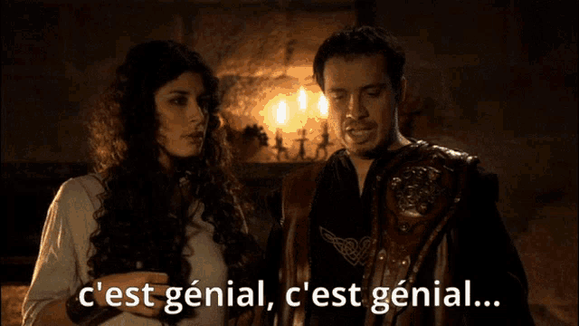 a man and a woman are standing next to each other with the words c'est genial c'est genial
