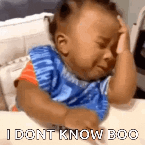 a baby is crying and holding his head with the words i dont know boo written on the bottom