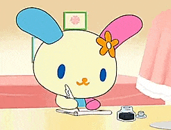 a cartoon rabbit is writing on a piece of paper .