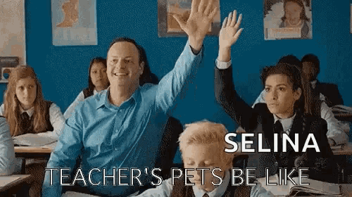 a teacher and a student are raising their hands in a classroom to answer a question .